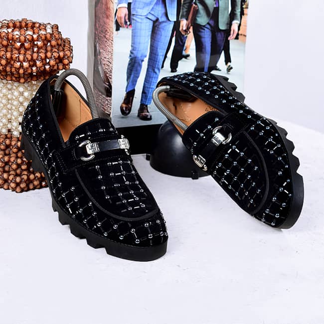 Billionaire men storn and bead shoe